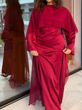 The silk cape dress in burgundy